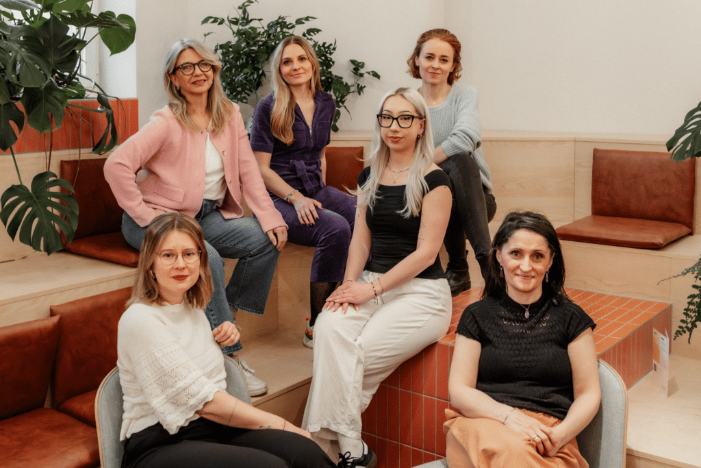 a group of women posing for a photo